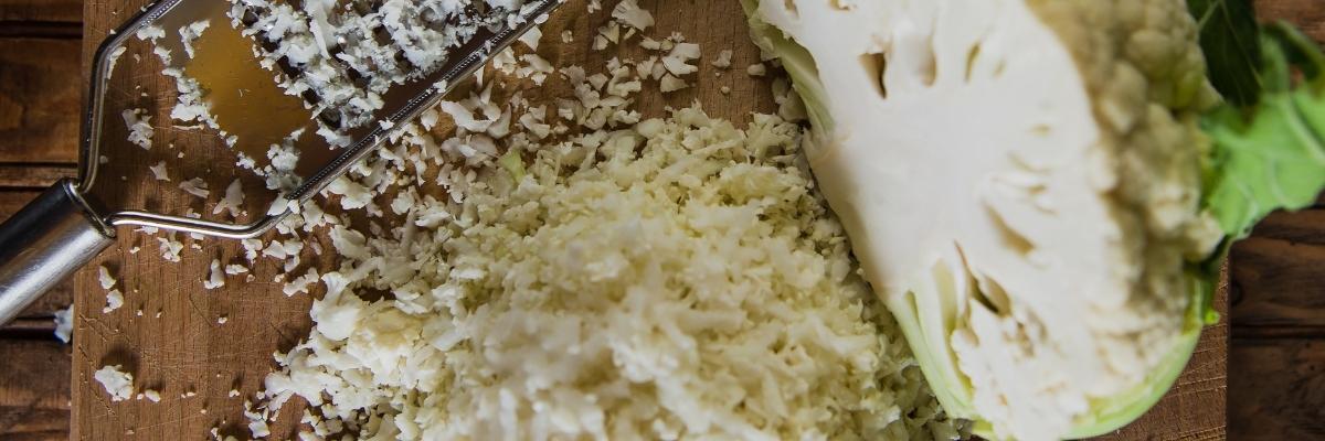 Grate raw cauliflower to make cauliflower rice - a low-carb alternative to rice.