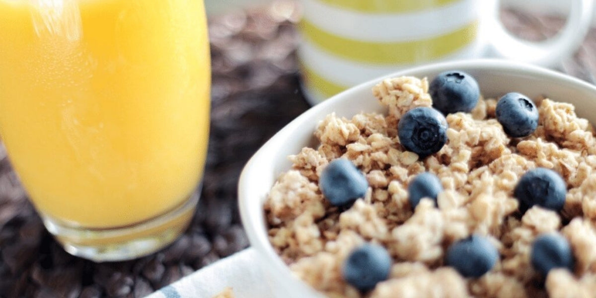 Sugary start to the day; glass of orange juice, sugary granola.