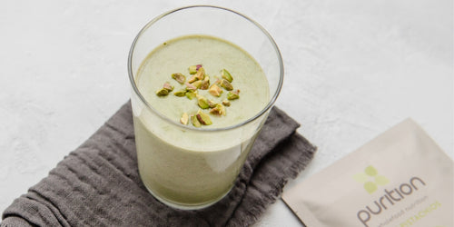 Healthy vegan breakfast shake with pistachio nuts