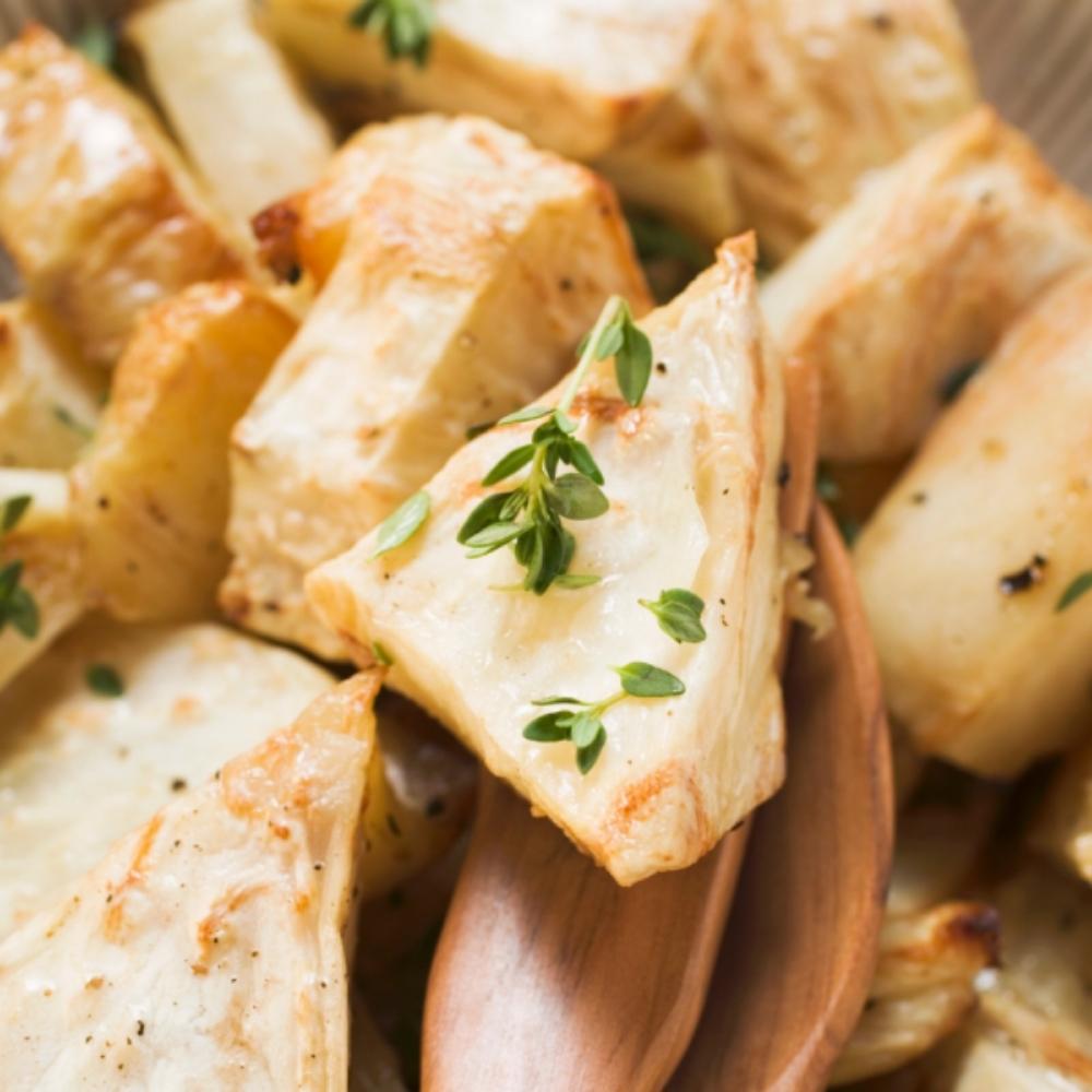 Bowl of roasted celeriac with herbs