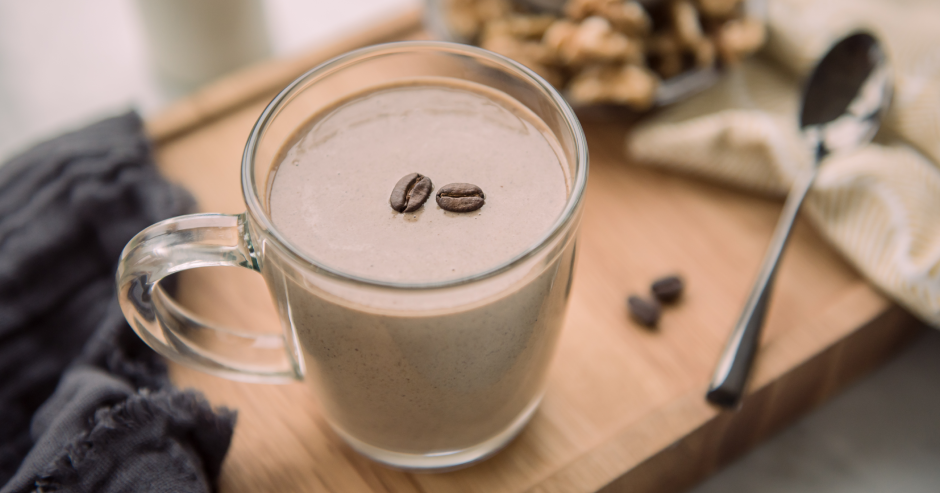 A glass mug of a Coffee & Walnut breakfast smoothie.